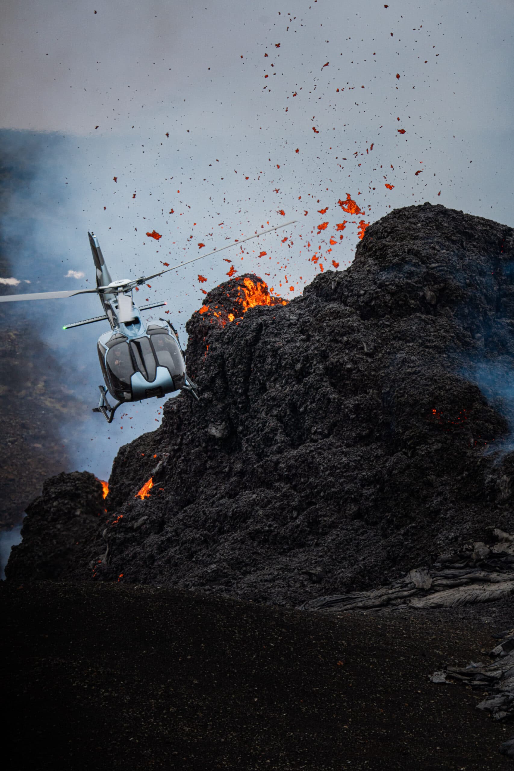 Person taking picture in a helicopter