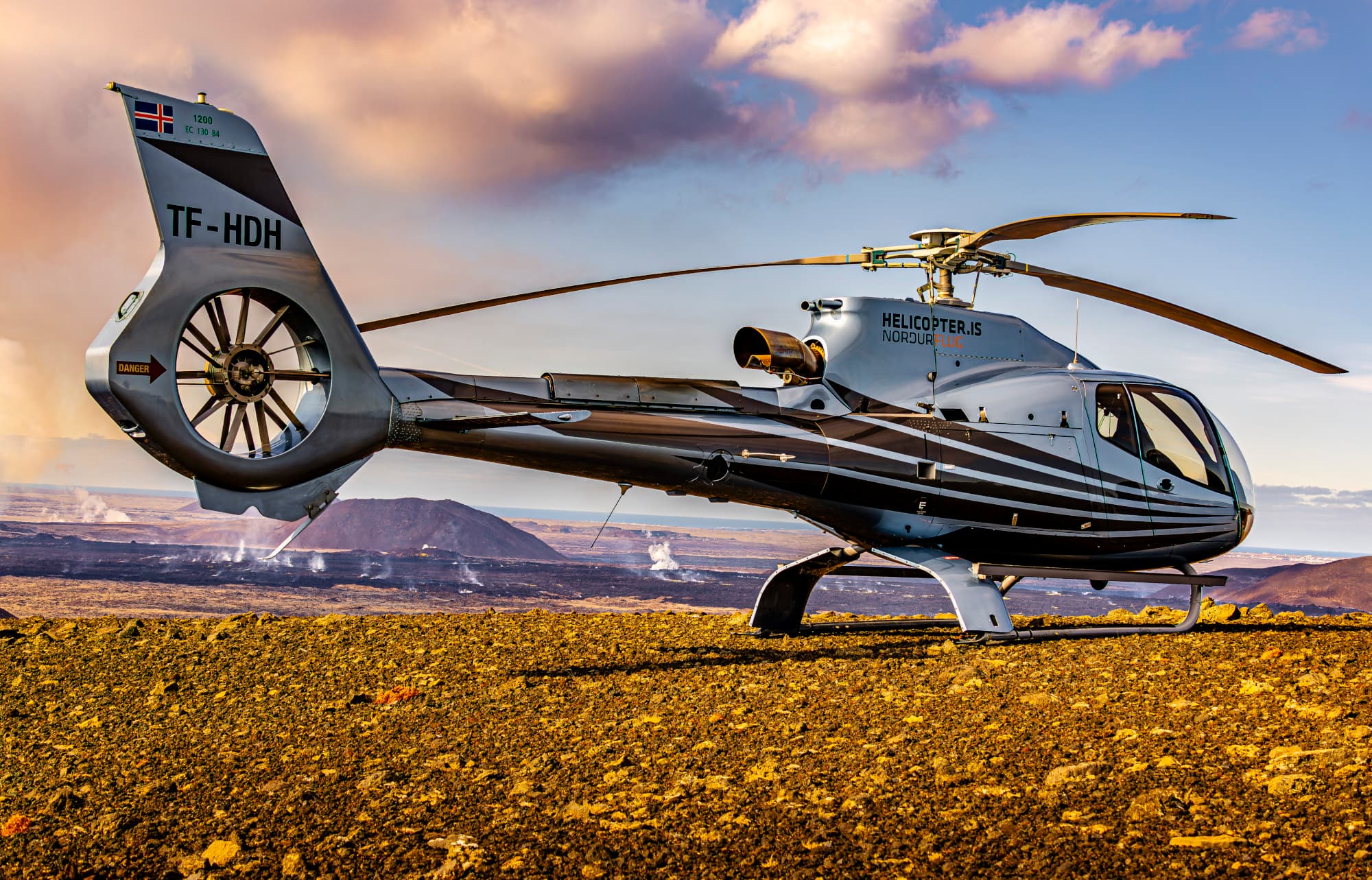 Person taking picture in a helicopter