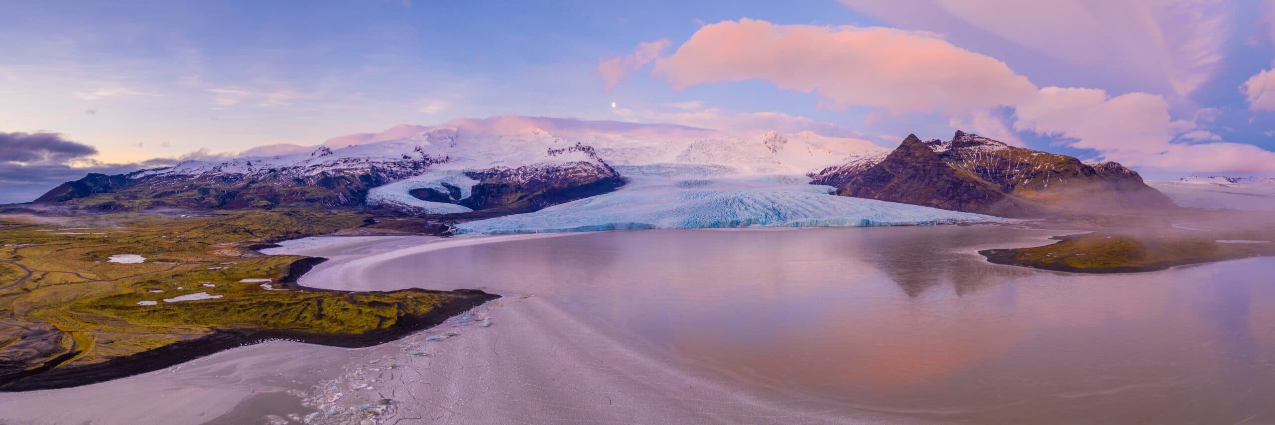 Helicopter flying over a mountain range