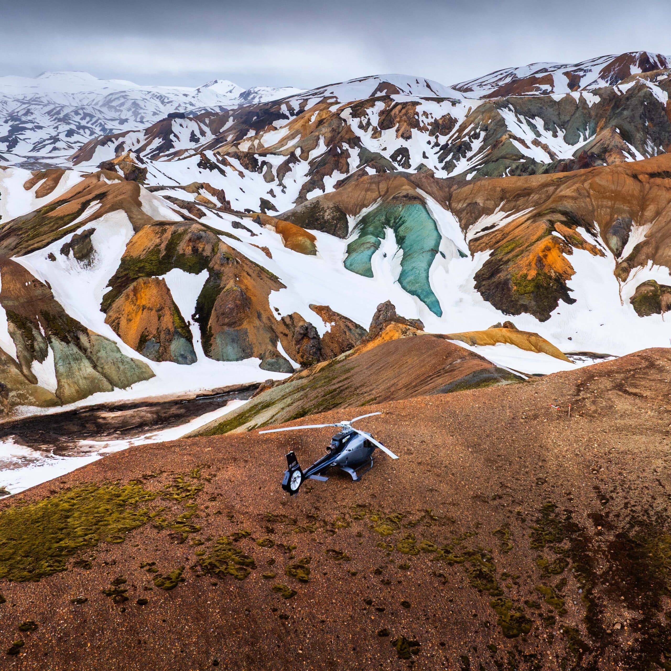 Person taking picture in a helicopter